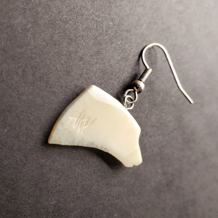 Polar bear drop earrings in walrus ivory.