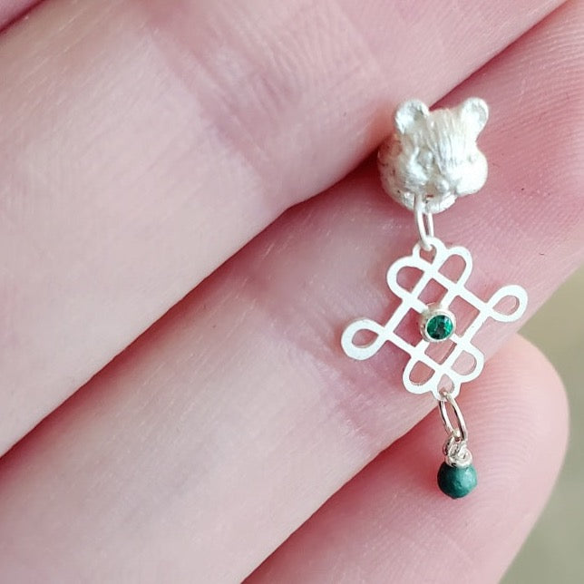 Squireow Amulet earrings of sterling silver, emerald, and jade beads.