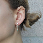 Squireow Amulet earrings of sterling silver, emerald, and jade beads.