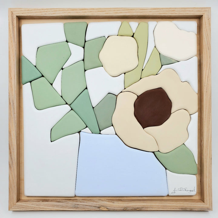 Sit for a Minute! - Hand molded clay coloured pieces within a solid wood frame, depicting a still life of warmly coloured flowers.  Measures 38 x 38 x 2.5 cm