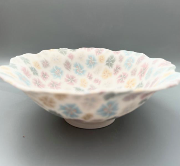 Small multicolour ceramic floral bowl, made with the nerikomi ceramic technique. 