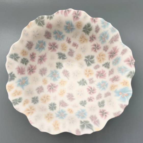 Small multicolour ceramic floral bowl, made with the nerikomi ceramic technique. 