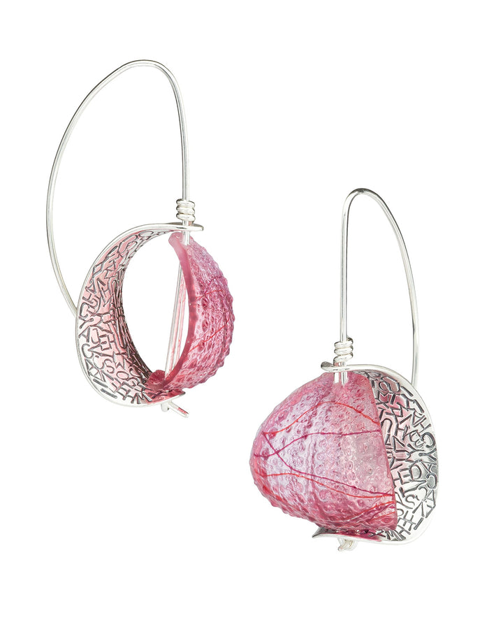 Mary Lynn Podiluk Retroflex ﻿earrings in various colours of hand-dyed resin with sterling silver.  This piece is part of the Resonance collection