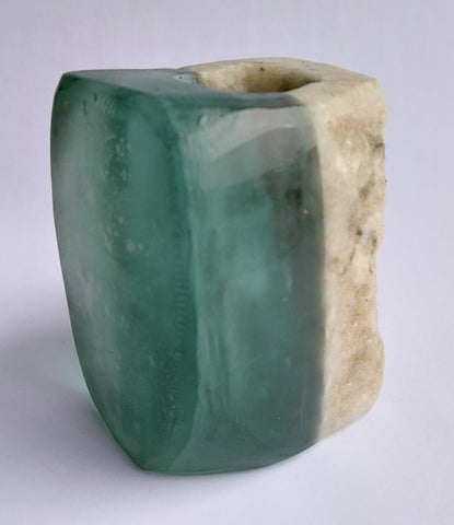 Stone and Glass Vase   Fused rock and recycled plate glass. 3.75 w x 4 h x 3 d inches