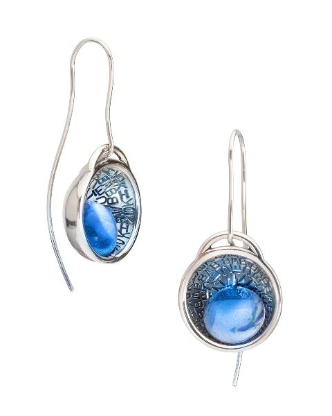Amplify earrings made with resin and sterling silver.    This piece is part of the Resonance collection, a language-inspired interplay of light and colour between lustrous surfaces and vibrant transparency.  Sold individually and colours may vary from images shown.
