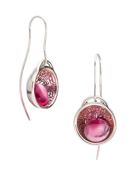Amplify earrings made with resin and sterling silver.    This piece is part of the Resonance collection, a language-inspired interplay of light and colour between lustrous surfaces and vibrant transparency.  Sold individually and colours may vary from images shown.