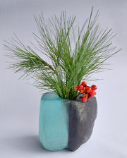 Stone and Glass Vase   Fused rock and recycled plate glass. 4.5 w x 4 h x  3 d inches