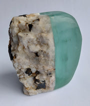 Stone and Glass Vase   Fused rock and recycled plate glass.  3.75 w x 4 h x 2.5 d inches