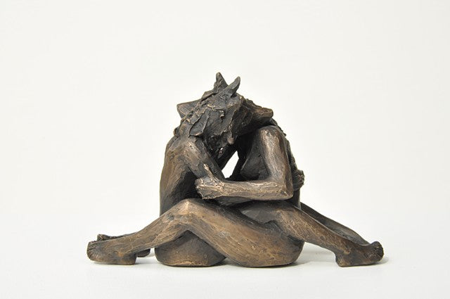 Anna Williams She Wolves in double. Two She Wolves in a face-to-face embrace. Individual cast bronze sculpture, approx. 7" x 4" x 3".
