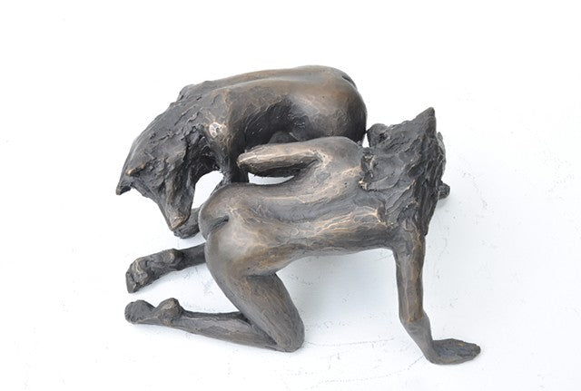 She Wolves in double. Two She Wolves in a scent circle. Individual cast bronze sculpture, approx. 7" x 4" x 3".