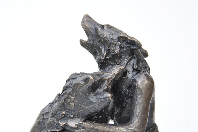 Anna Williams She Wolves in double. Two She Wolves sitting face-to-face, holding one another. Individual cast bronze sculpture, approx. 7" x 4" x 3".