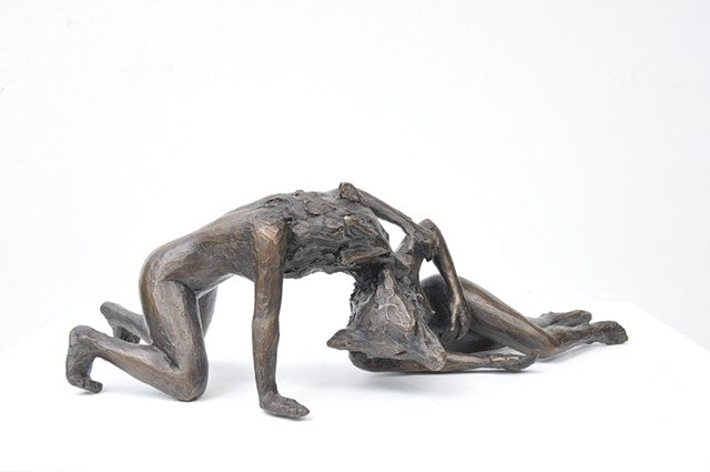 Anna Williams She Wolves in double. One She Wolf biting the neck of another. Individual cast bronze sculpture, approx. 7" x 4" x 3".