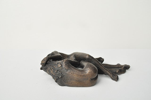 Anna Williams She Wolves in double. Two She Wolves lying face-to-face. Individual cast bronze sculpture, approx. 7" x 4" x 3".