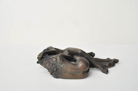 Anna Williams She Wolves in double. Two She Wolves lying face-to-face. Individual cast bronze sculpture, approx. 7" x 4" x 3".