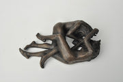 Anna Williams She Wolves in double. Two She Wolves lying face-to-face. Individual cast bronze sculpture, approx. 7" x 4" x 3".