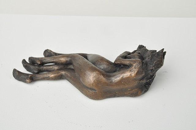 She Wolves in double. Two She Wolves in a back-to-back embrace. Individual cast bronze sculpture, approx. 7" x 4" x 3".