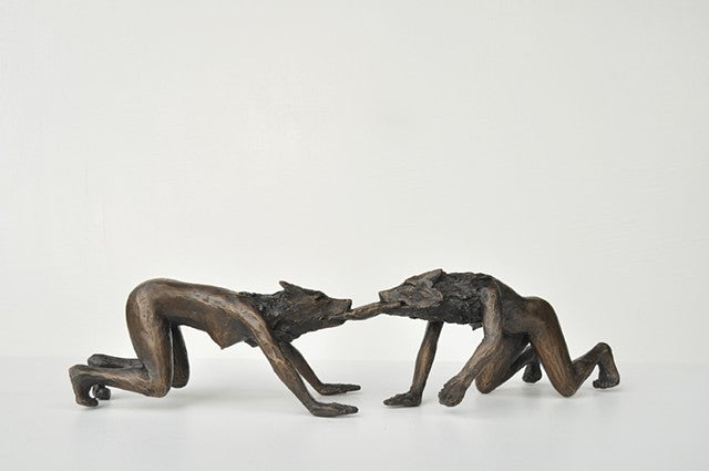 Anna Williams She Wolves in double. Two She Wolves fighting over meat. Individual cast bronze sculpture, approx. 7" x 4" x 3".