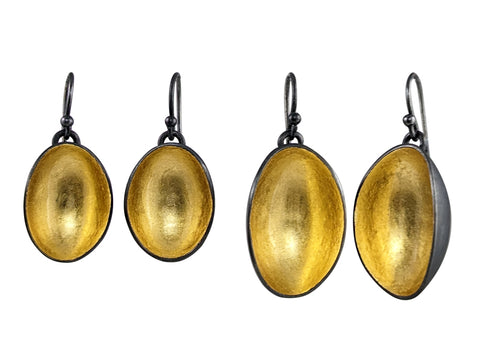 Light drop earrings in vertical. These concave forms are made from patinated sterling silver with 22k gold leaf and resin. Available in two different sizes.