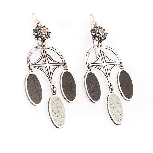 Andromède: From the Nos Jardins series, dangle earrings in sterling silver and green+black concrete, with a pink-centered flower.