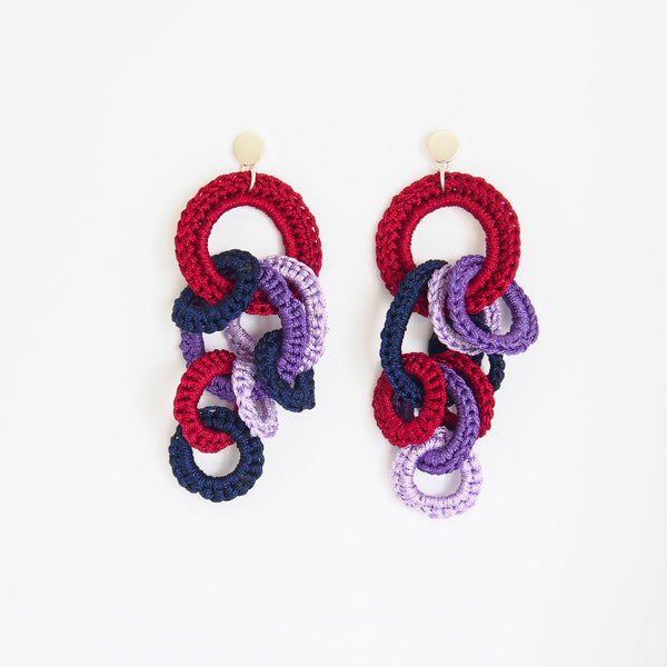 Minuit Earrings in marine, lavender, cherry red and purple - made from woven polyester threads and sterling silver hooks. Light and fun to wear, these impressive pieces are one of a kind.   5.2 x 9.4 x 2.2 cm