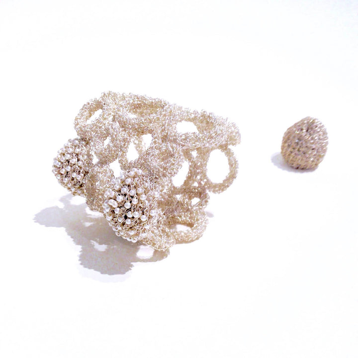 Half Empty Bezel bracelet with fine silver, pearls and magnets pictured with ring.