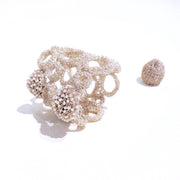 Half Empty Bezel bracelet with fine silver, pearls and magnets pictured with ring.