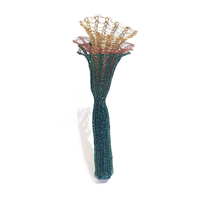  Green and Brass On Being Female brooch with coloured copper wire, copper, brass, spandex and tampons.