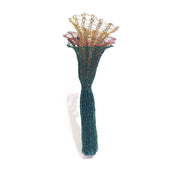  Green and Brass On Being Female brooch with coloured copper wire, copper, brass, spandex and tampons.