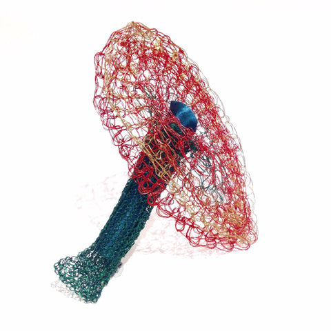 Large Red On Being Female brooch with coloured copper wire, copper, brass, spandex and tampons.