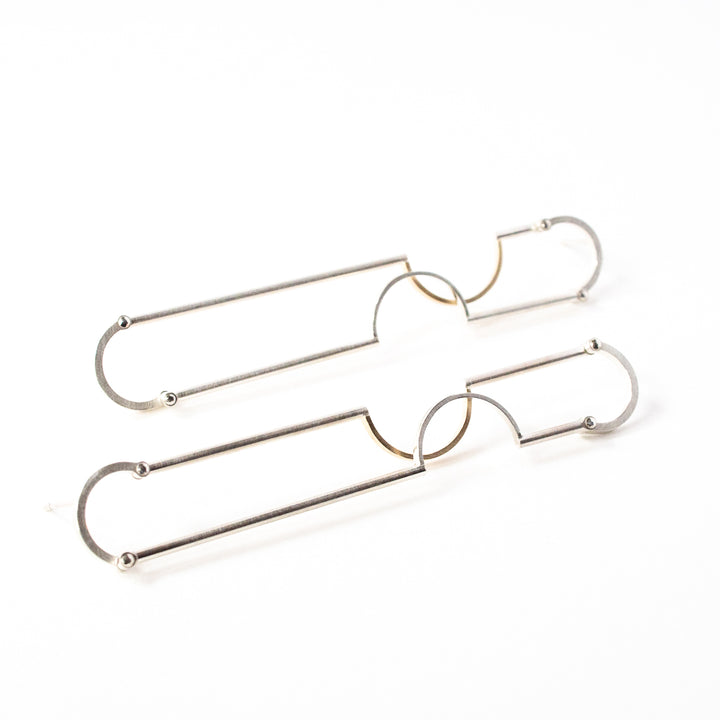Long silver and gold oscillation earrings