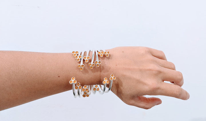 Bloom cuff bracelet in sterling silver with 22k gold leaf, detail. 