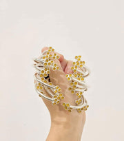 Bloom cuff bracelet in sterling silver with 22k gold leaf, detail. 