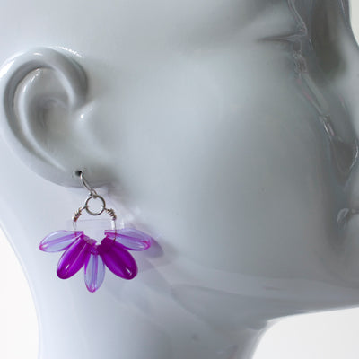 Multi-purple Bloom Earrings of silicone, acrylic, and sterling silver.