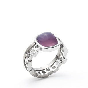 Lavender chalcedony set in 14k white gold cubed on a cubed band that plays elegantly against the companion strict titanium band. Size 5.5