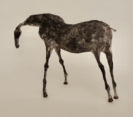 Creagan V - 2022. Mixed-media sculpture of a horse made from paper and metal.