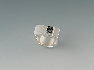 Sterling silver ring with iron ore