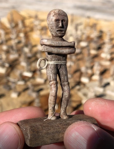 Small man with horizontal arms