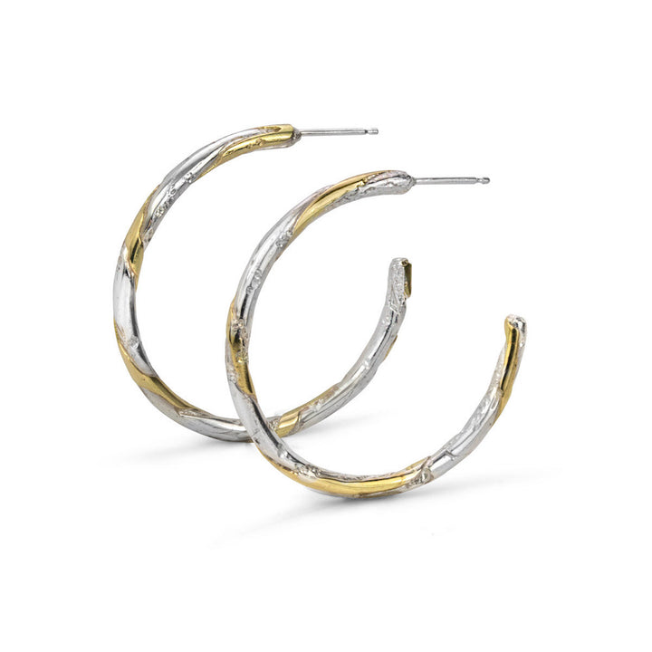 Core Sample Hoop Earrings made from sterling silver and 18k yellow gold using wire lamination technique.