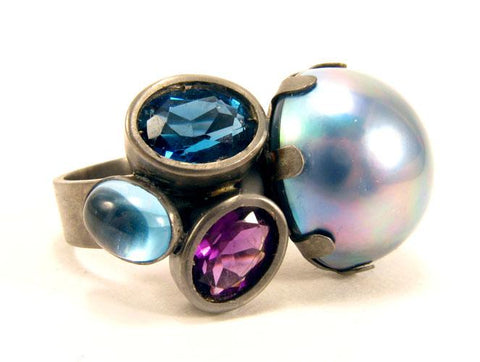 Float Ring.   Black rhodium plated sterling silver, mabe pearl, London blue topaz, Swiss blue topaz, amethyst