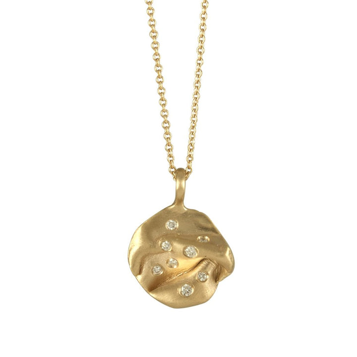 14k gold fold pendant studded with white diamonds.
