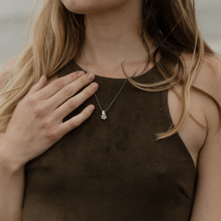  Audrée H. St-Amour Gem cage pendant, Oregon-mined sunstone. Multi-dimentional cage pendant.  Artist-made clasp.  Chain length is 41cm. Pendant is 1.5cm long.