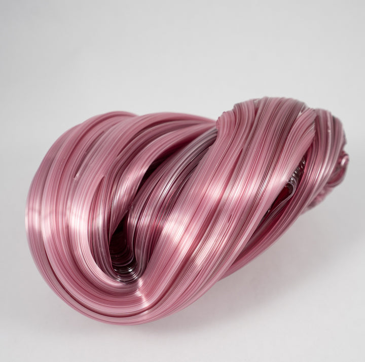 Raspberry Sherbert - Glass sculpture. In a large graceful sweep, this one of a kind sculpture measures 16 x 10 x 8 cm. 