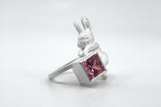 Hang Tight. One of a kind sterling silver ring, with rose cut pink topaz. Size 7.5   Hanging off a tight corner, this rabbit is not giving up!