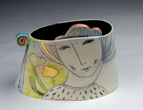 Homey, short vase in cone 6 stoneware, finished with glazes, underglazes and gold luster.  6 x 7 x 4"