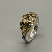 Hand stamped sterling silver ring with a bubble of stunning green Australian sapphires, diamonds, and 18k gold. 
