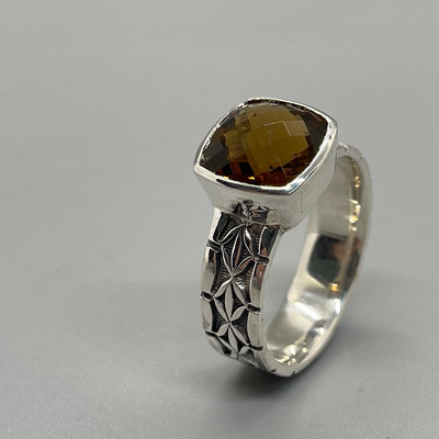 Hand stamped sterling silver ring a large smoky quartz stone.