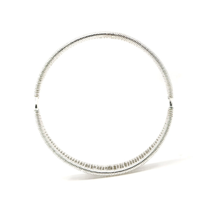 Bilateral no. 3 bangle, hand-woven in sterling silver. 