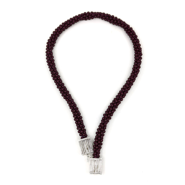 Blackberry Hook: Kumihimo braided and woven necklace of sterling silver, purple Swarovski pearls, & silk ribbon. 