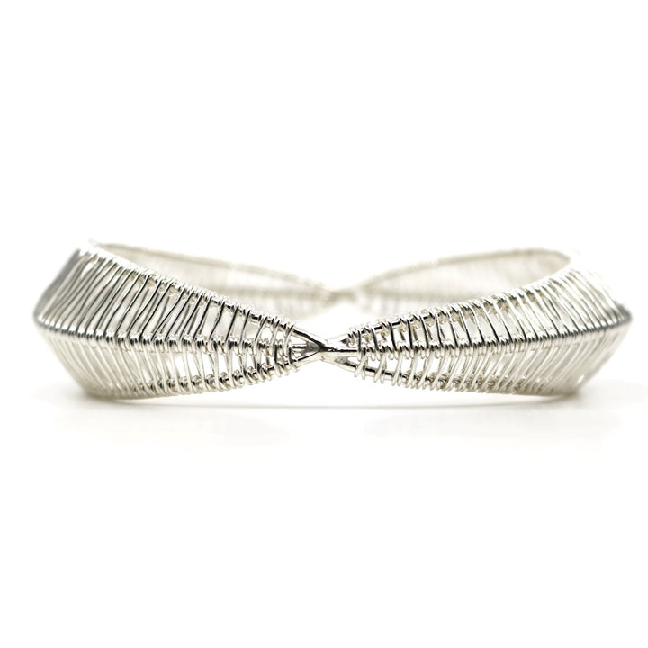 Bilateral no. 2 bangle, hand-woven in sterling silver. 