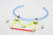 A Personal Geometry, neckpiece.  Hand fabricated sterling silver, neon acrylic, mother of pearl.